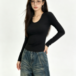 Áo body nữ cổ tròn rộng tay dài màu đen – ảnh chính Sweet Fable